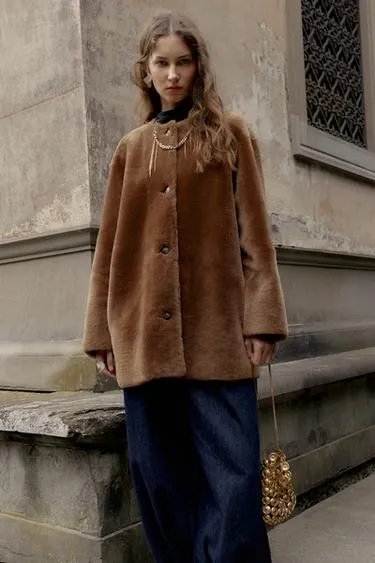 Двустороннее пальто из 100% кожи- Заказать в России