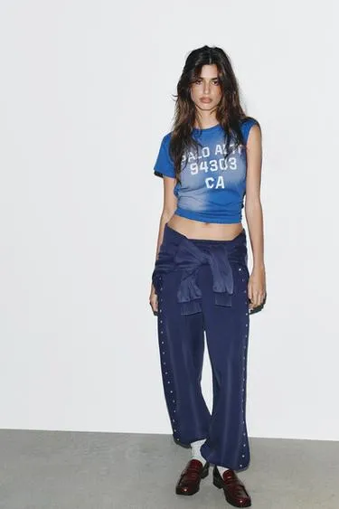 Джоггеры из ткани с эффектом потертости с заклепками- Заказать в России