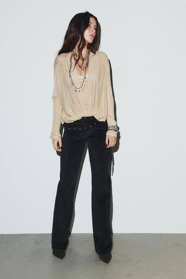 Zara Расклешенные брюки с декором парео и заклепками купить с доставкой.