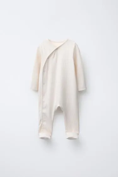 Комбинезон с регулируемыми штанинами и V-образным вырезом- Заказать в России