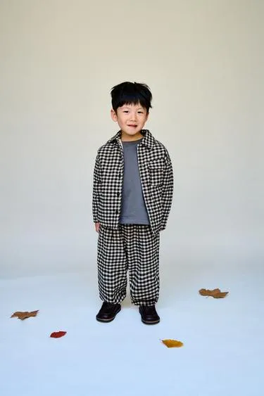 Брюки в клетку с объемным кроем