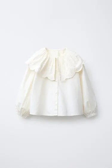 Блуза с большим отложным воротником и вышивкой- Заказать в России