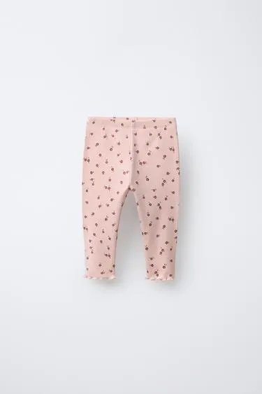 Легинсы в рубчик с цветочным принтом