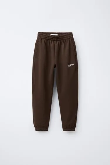 Брюки-джоггеры с надписью