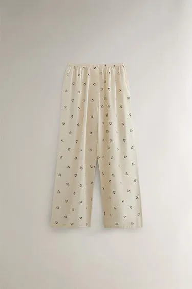 Штаны с рождественским принтом листьев