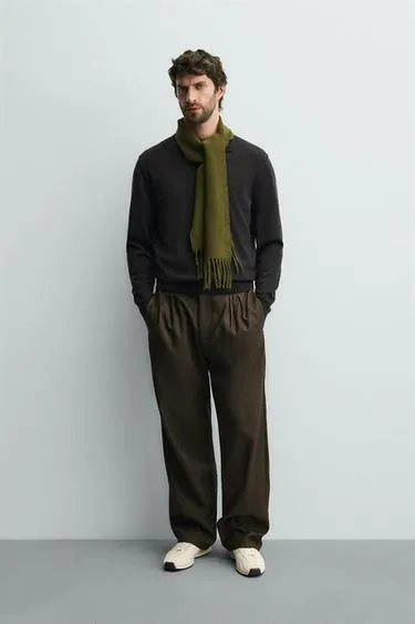 Поло из 100% шерсти