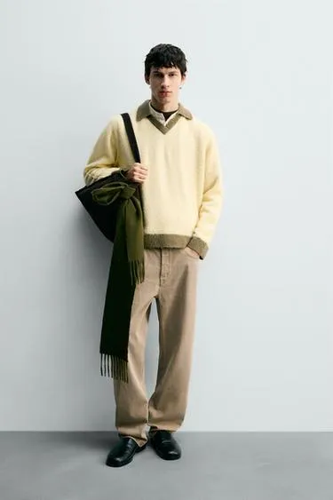 Поло из трикотажа с контрастными элементами и шерстью- Заказать в России