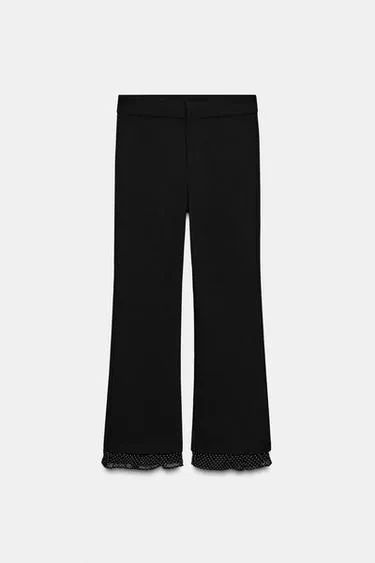 Мини-брюки с расклешенными штанинами и оборкой