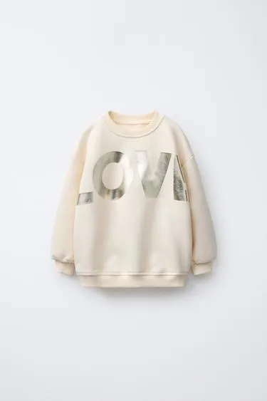 Толстовка с блестящей надписью