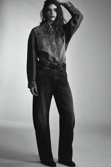 Джинсы TRF с металлическими заклепками- Заказать в России