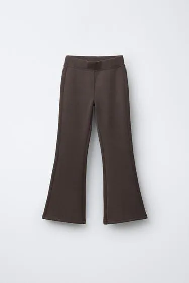 Брюки спортивного покроя с расклешенными штанинами- Заказать в России