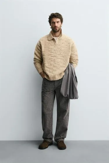 Поло из 100% шерсти на пуговицах