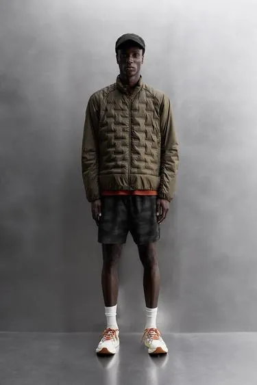 Стеганая куртка с наполнителем из пуха для бега- Заказать в России