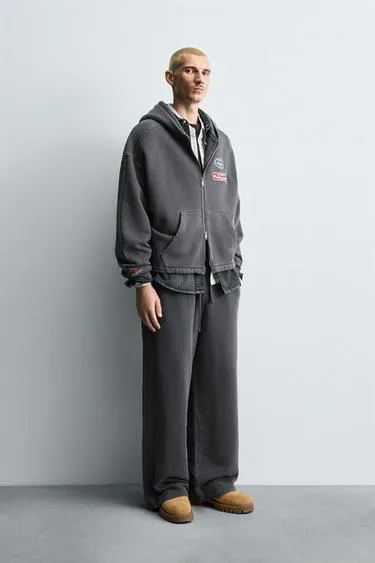 Джоггеры WIDE FIT с эффектом потертости- Заказать в России