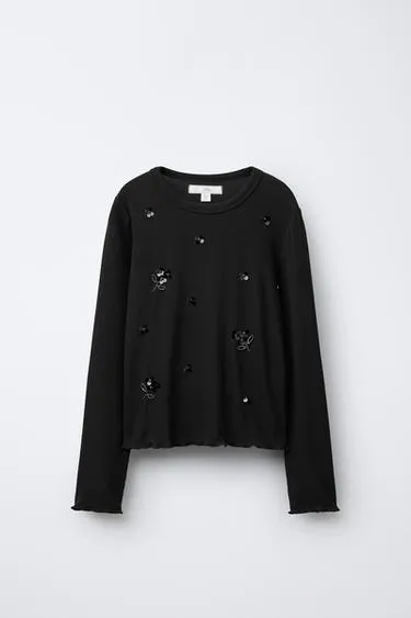 Футболка в рубчик с пайетками