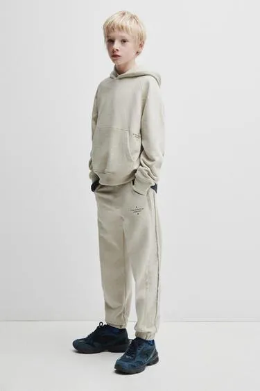 Брюки-джоггеры из комбинированной ткани