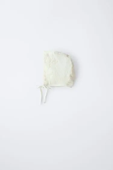 Шапка с регулируемыми передними завязками