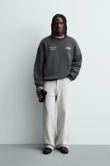 Свитшот с комбинированным принтом- Заказать в России