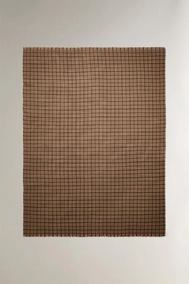 Плед в клетку с бахромой