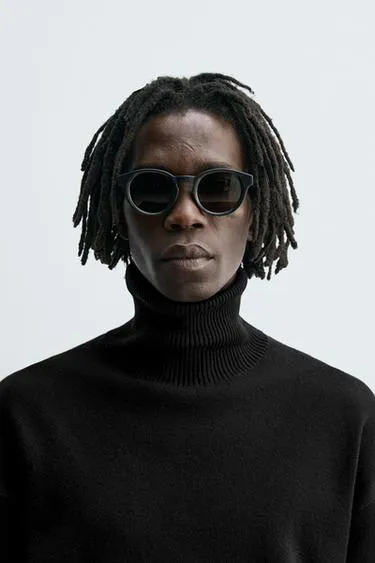 Солнцезащитные очки в круглой оправе