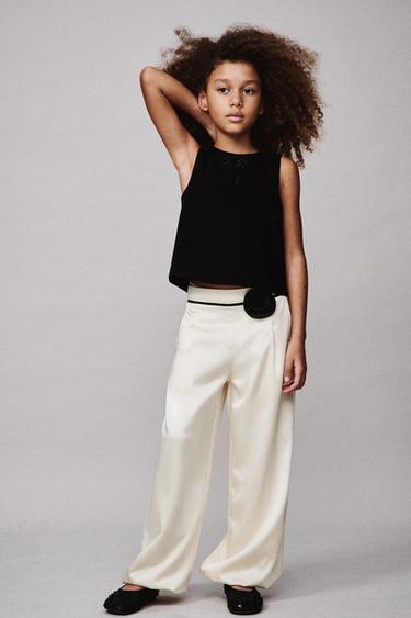 Zara Брюки-бомбашки с цветком купить с доставкой.