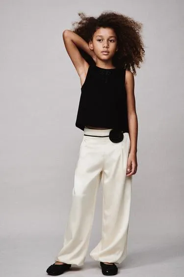 Брюки-бомбашки с цветком- Заказать в России