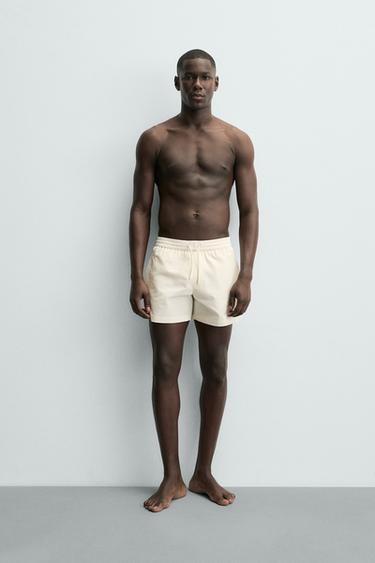 Zara Полупрозрачные плавки из технической ткани средней длины ZARA купить с доставкой.