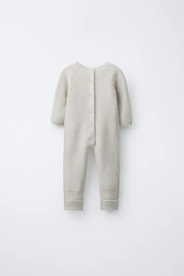 Вязаный комбинезон с вышивкой цветов- Заказать в России