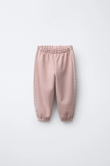 Брюки-джоггеры с цветочным кружевом