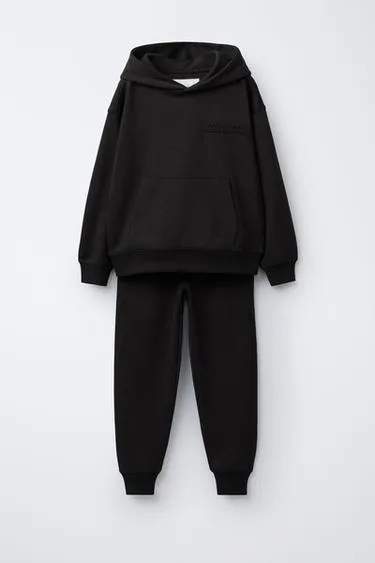 Костюм с капюшоном и брюками с принтом на резинке- Заказать в России