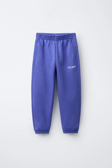 Спортивные брюки с текстовым узором