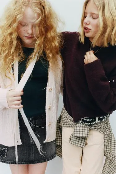 Вязаный свитер с заклепками- Заказать в России