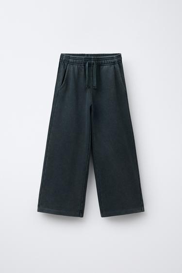 Zara Брюки WIDE LEG с эффектом потертости, звездами и заклепками купить с доставкой.