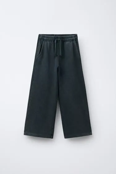 Брюки WIDE LEG с эффектом потертости, звездами и заклепками