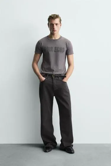 Футболка кроп с надписью и эффектом потертости- Заказать в России