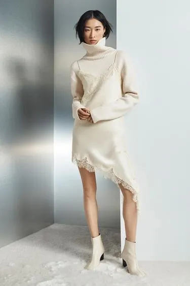 Шерстяной свитер с высоким воротником- Заказать в России