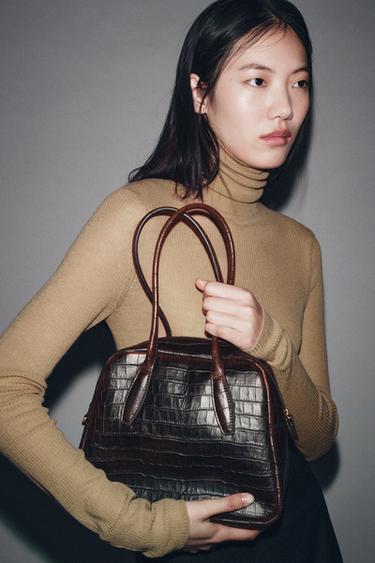 Кожаная сумка-боулинг с рельефным узором- Заказать в России