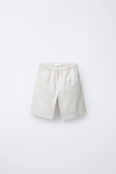 Шорты хлопковые с нашивкой- Заказать в России