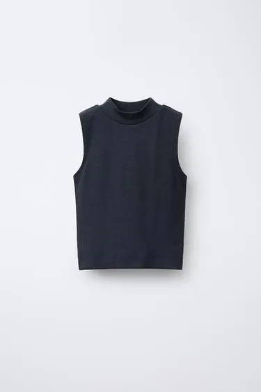 Однотонный топ из модала- Заказать в России