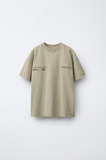 Футболка с рельефным принтом- Заказать в России