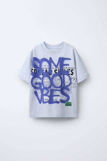 Футболка с граффити-спрей принтом- Заказать в России