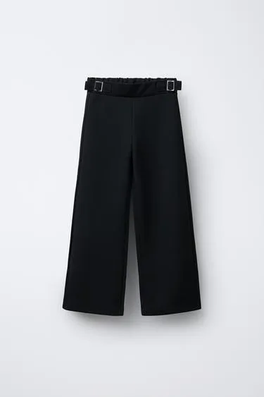 Брюки костюмные с пряжками