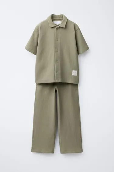 Комплект из рубашки и брюк из ткани оттоман с нашивкой- Заказать в России