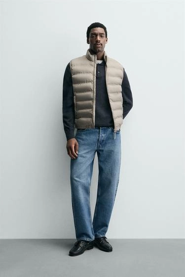 Полупрозрачный пуховый жилет с водоотталкивающей отделкой