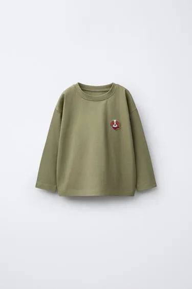 Футболка с прорезиненным анималистическим принтом- Заказать в России