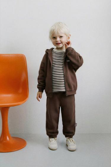 Zara Толстовка на молнии с текстом купить с доставкой.