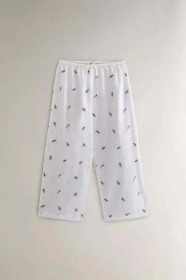 Брюки с цветочной вышивкой