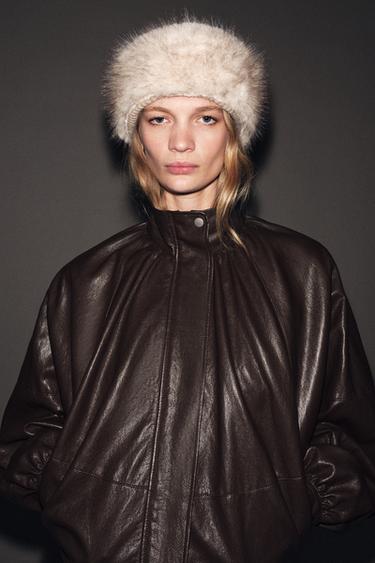 Трикотажная шапка бини с отделкой из искусственного меха