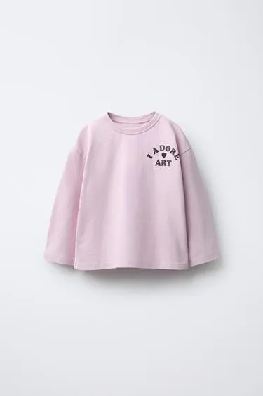 Лонгслив с блестящим принтом