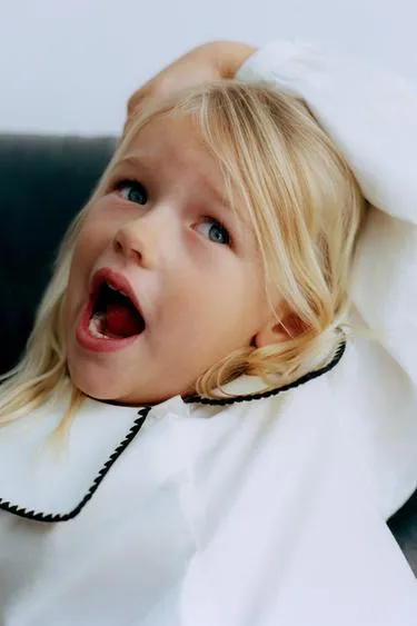 Блуза с круглым воротником и вышивкой- Заказать в России